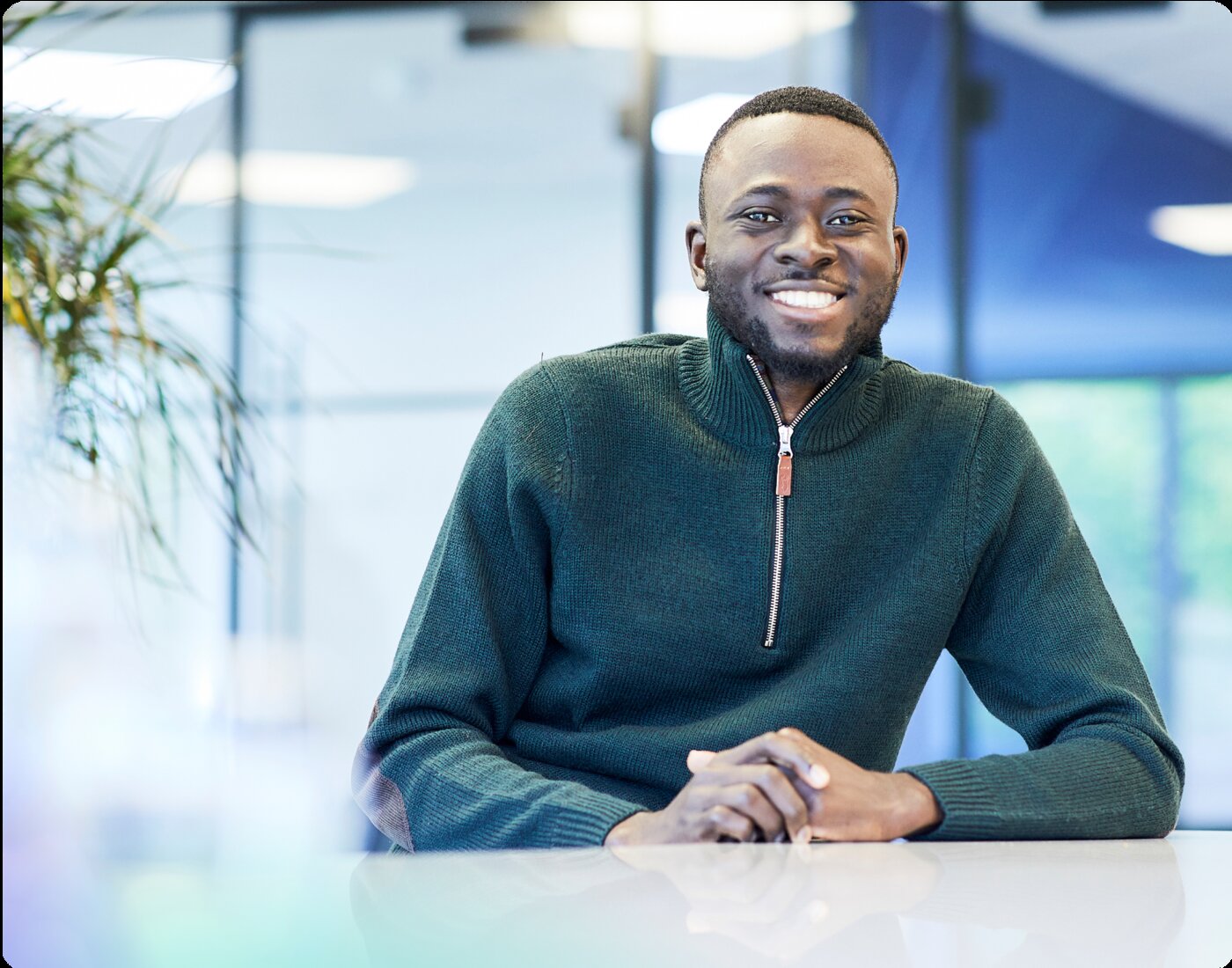 BCN team member smiling in the Manchester office